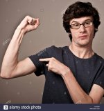 a-weak-feeble-geek-nerd-young-man-with-thin-arms-wearing-glasses-flexing-C3YDB1.jpg